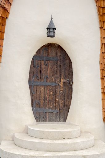 A vertical shot of the fairytale clay castle in Porumbacu village