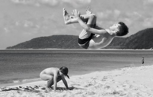 A grayscale of an Australian family on the beach