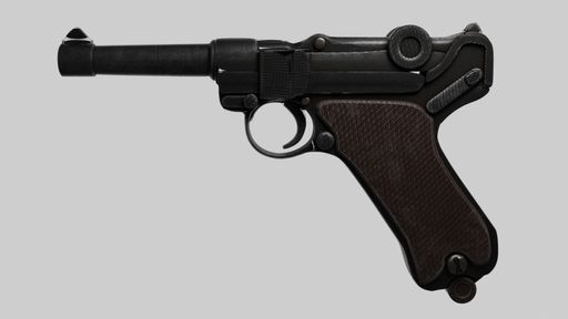 A closeup shot of a black luger pistol on an isolated background