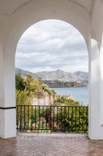A vertical shot of Europe Square balcony in coastal town Nerja, Malaga, Spain