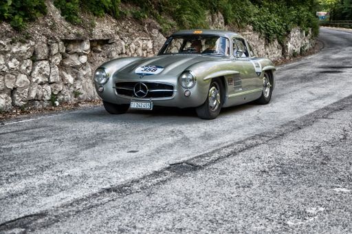 A scenic view of a Mercedes-Benz 300 SL vintage car in Furlo, Italy
