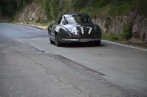 A scenic view of a Mercedes-Benz 300 SL vintage car in Furlo, Italy