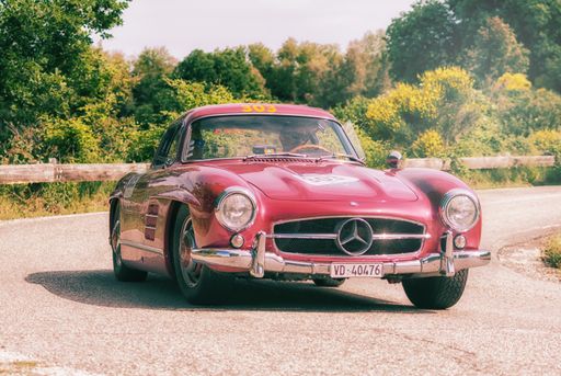 A scenic view of a Mercedes-Benz 300 SL vintage car in Pesaro, Italy