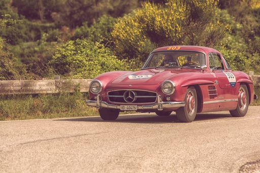 A scenic view of a Mercedes-Benz 300 SL vintage car in Pesaro, Italy