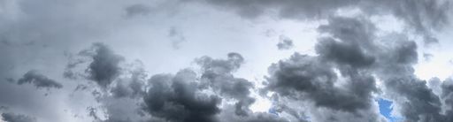 A heavy cloudscape in a gloomy grey sky