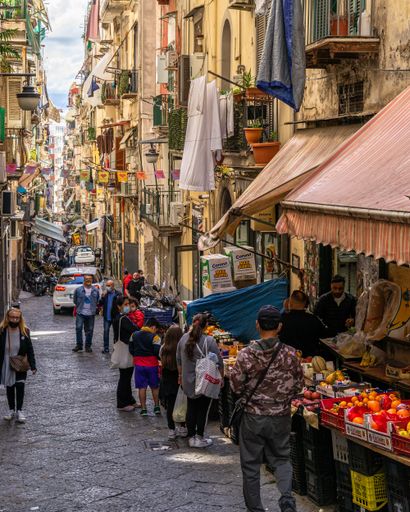 Naples, Italy, May 2021 - A busy street of Quartieri Spagnoli (Spanish Neighborhoods) one of the main sights of Naples historic center