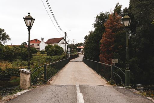 A small bridge over the river in a small town