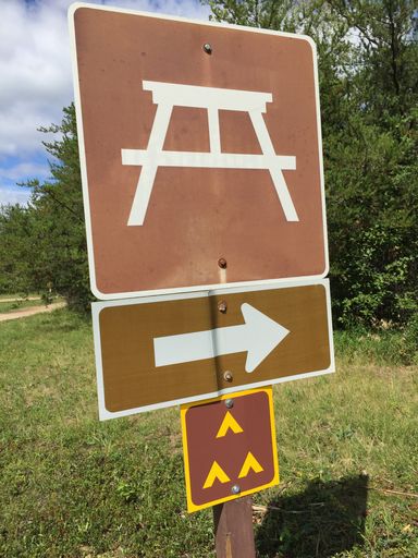 A group camping and picnic area sign