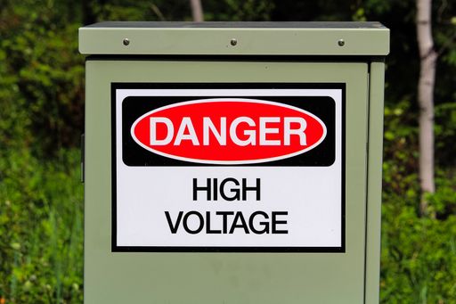 A danger high voltage sign on an electrical box