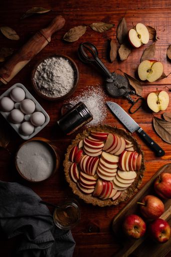 An overhead shot of a homemade apple pie ready to be baked