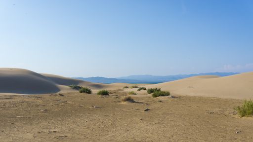 A dessert with a blue clear sky during daytime