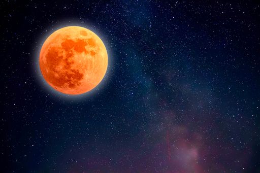 The bloody full Moon in the starry sky