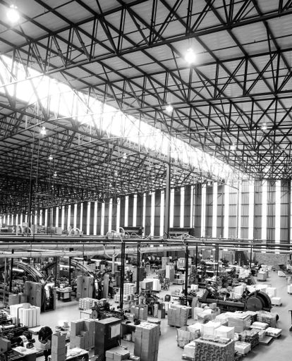 A vertical shot of a printing and packaging factory facility from inside in Johannesburg, South Africa