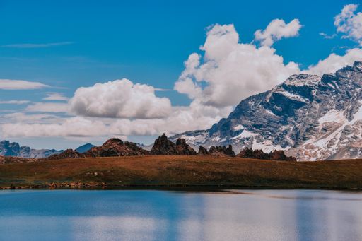 A beautiful view of the snowy rocky Gran Paradiso mountain in the Graian Alps in Italy