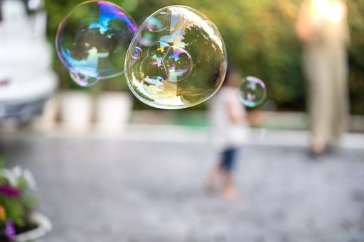 A closeup shot of soap bubbles floating in the air