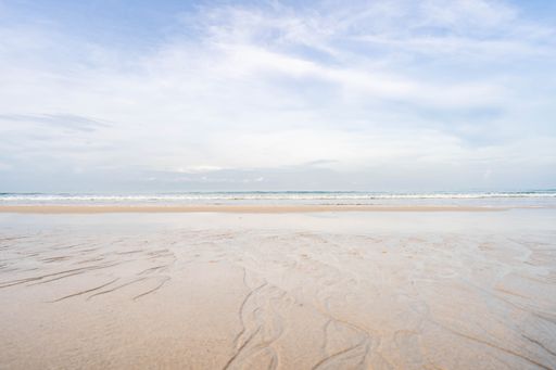 A mesmerizing view of a beautiful seascape under a blue sky