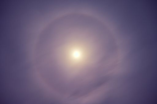 A shot of the direct sunlight and the spectrum it creates in the round shape.