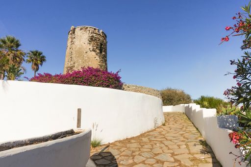 A 16th century medieval watch tower Torre vigia de Torremuelle in Benalmadena, Costa del Sol, Spain