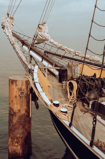 A vertical closeup shot of the front of a traditional pirates ship