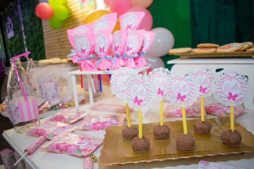 A birthday celebration decorated table with desserts