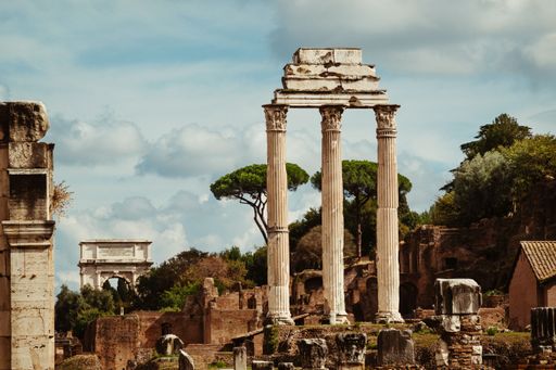 Ancient ruins of the Roman Forum with a clear blue sky