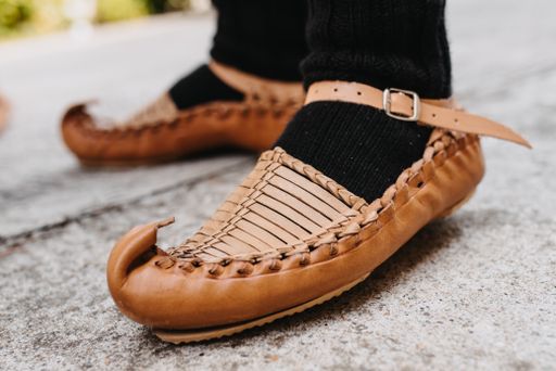 Serbian traditional folk costume.
traditional footwear - slippers