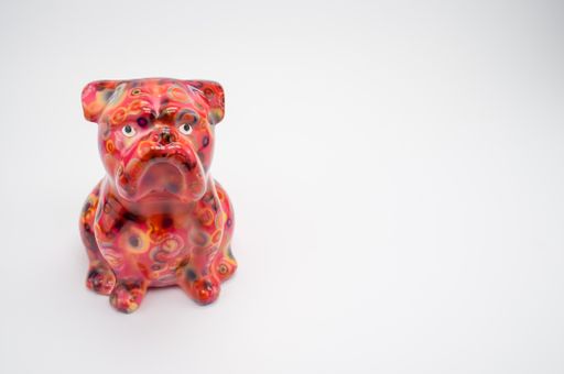 A closeup shot of a dog as a souvenir isolated on white
