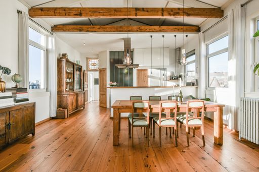 The kitchen and the dining room of a modern apartment