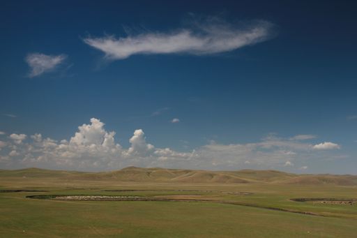 A beautiful green grassland under a breathtaking cloudy sky in Inner Mongolia