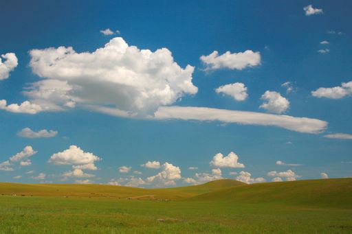 A beautiful green grassland under a breathtaking cloudy sky in Inner Mongolia