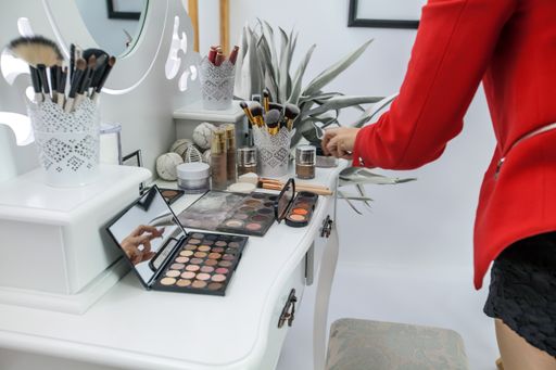 Different tools and brushes for a make-up artist are on a table