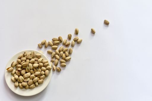 An overhead shot of nuts on a white background