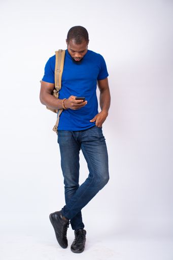 A black student using his phone