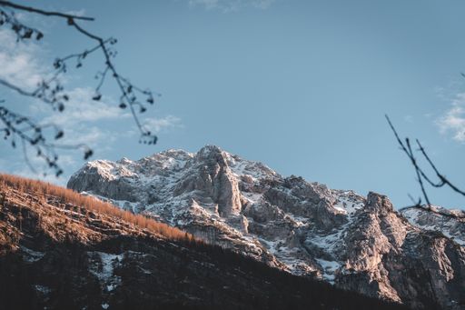 A beautiful landscape of a snowy mountain under the blue sky