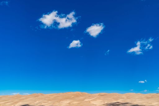 The sand dunes beneath a cloudy sky at Great Sand Dunes National Park, Colorado