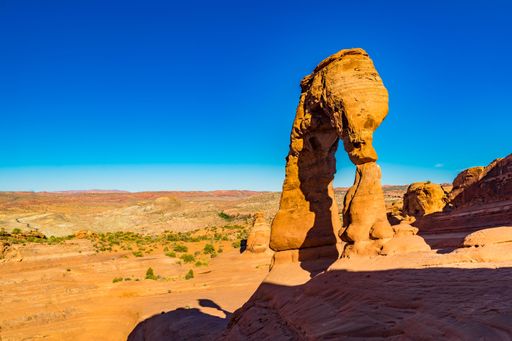 The Delicate Arch in Arches National Park, Utah, under a vibrant blue sky
