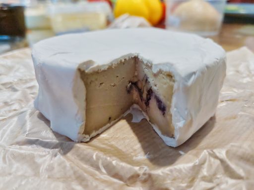 Close-up shot of vegan cheese made from walnuts. Plant-based food.