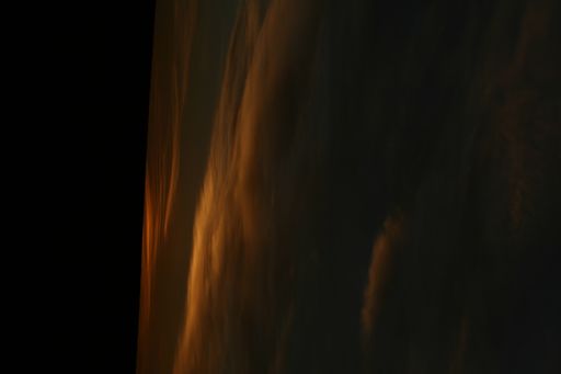 A vertical shot of the sunset sky captured the late evening