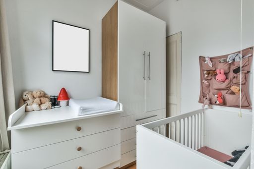 A modern room with furniture and the bright light coming from the window