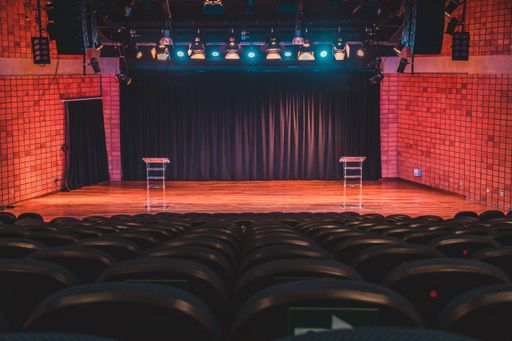 Conference stage with colored lights and full view