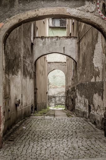 A vertical shot of an archway in the building