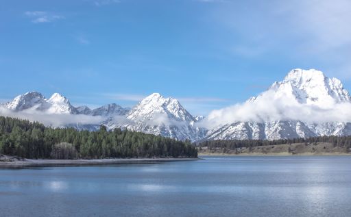 A beautiful mountain scene in Jackson, Wyoming, covered with snow.
