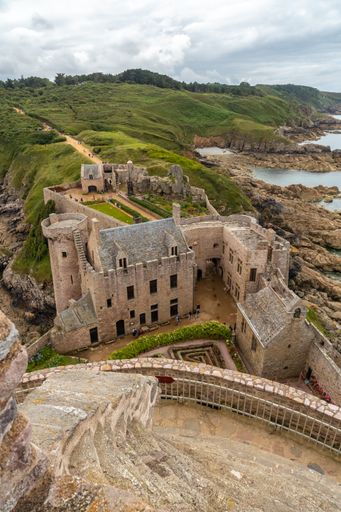 A vertical aerial view of the Castle Fort-la-Latte on the shore in Plevenon, France