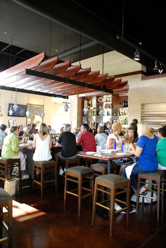 A vertical shot of people dining in a restaurant in Missouri