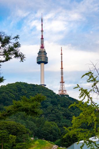 The Seoul Tower and a green dense forest in South Korea