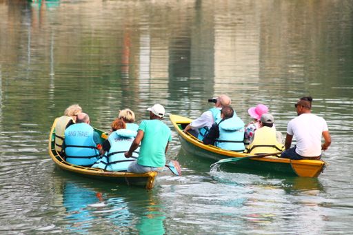 A group of tourist on a boat tour in Fewa Lake in Pokhara, Nepal