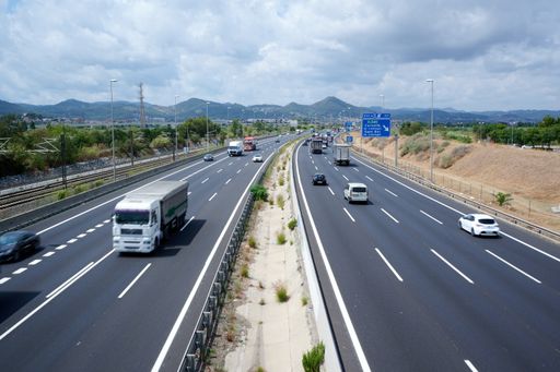 A closeup of a highway with vehicles. Barcelona, Spain.