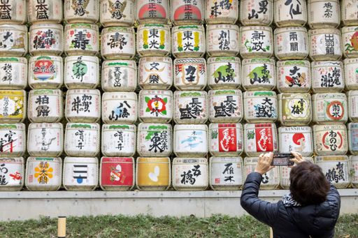 Tokyo, Japan: Inside the Meiji Shrine, a lot of straw barrels are decorated on the main street.