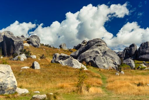 A beautiful view of the big and small rocks at castle hill New Zealand on a sunny day