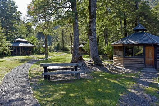 The beautiful shot of the park with picnic areas on a sunny day